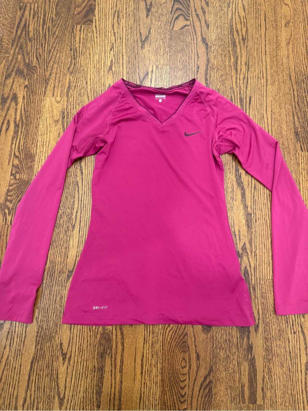 Nike Women's Magenta Dri-FIT Long Sleeve V-Neck Top